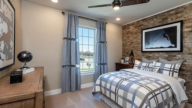 bedroom featuring baseboards, brick wall, ceiling fan, carpet, and recessed lighting