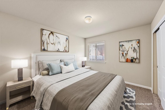 bedroom featuring carpet, a closet, and baseboards