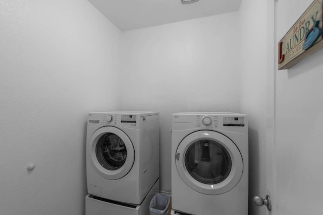 laundry room featuring washer and dryer and laundry area