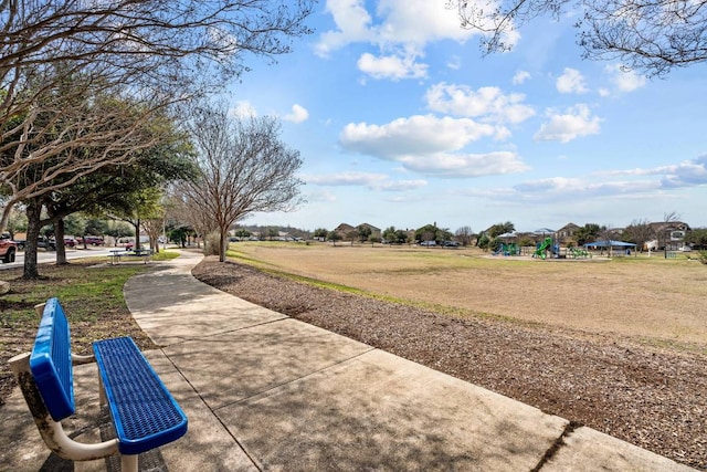 surrounding community featuring a lawn