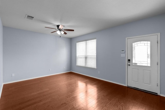 2202 Kuykendall Dr, Georgetown, TX 78626 - entryway featuring healthy amount of natural light, a ceiling fan, and wood finished floors