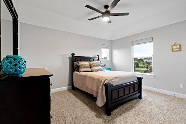 bedroom featuring a ceiling fan, carpet, and baseboards