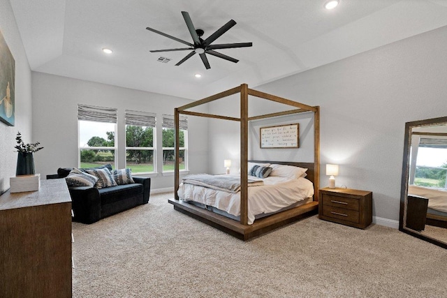 bedroom featuring light carpet, baseboards, visible vents, and recessed lighting