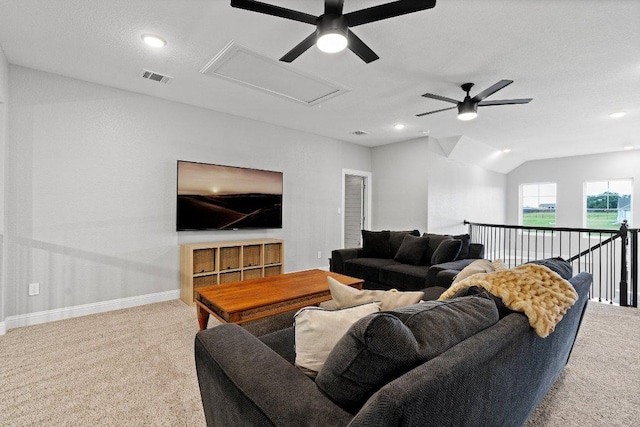 carpeted living area featuring recessed lighting, a ceiling fan, visible vents, vaulted ceiling, and baseboards