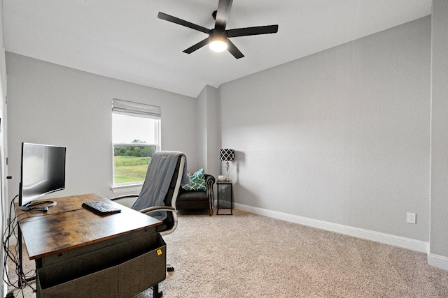 office area with lofted ceiling, carpet flooring, a ceiling fan, and baseboards