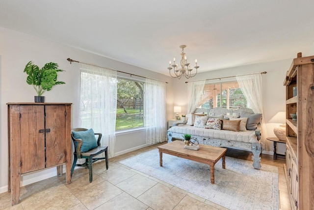 4113 Rimrock Dr, Lago Vista, TX 78645 - living room featuring baseboards and a chandelier