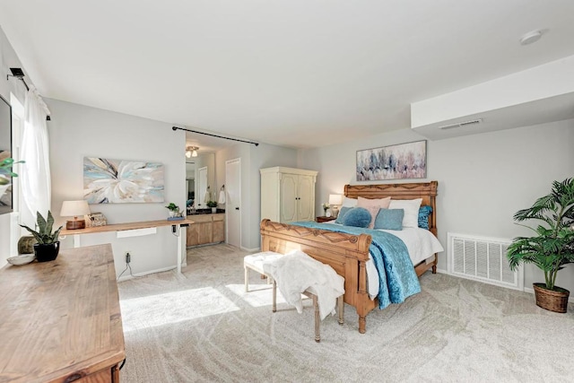 4113 Rimrock Dr, Lago Vista, TX 78645 - bedroom with visible vents and light colored carpet