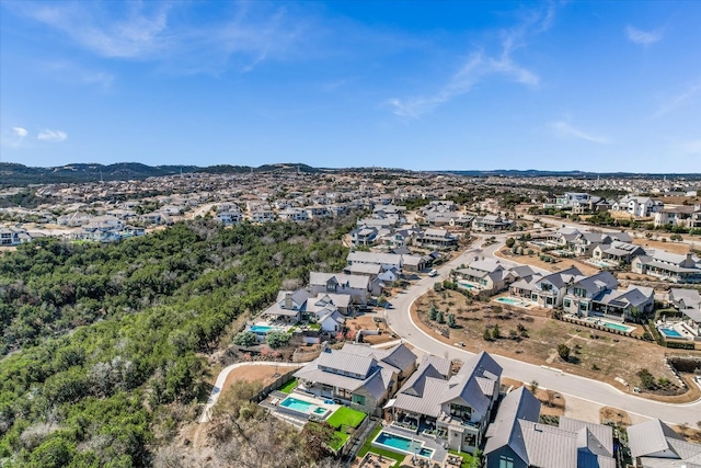 bird's eye view with a residential view and a mountain view