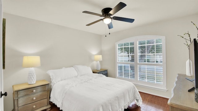 bedroom featuring ceiling fan and wood finished floors