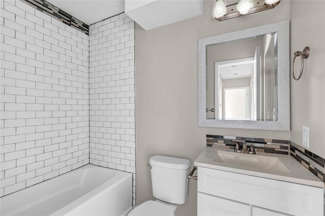 full bathroom featuring shower / washtub combination, vanity, and toilet