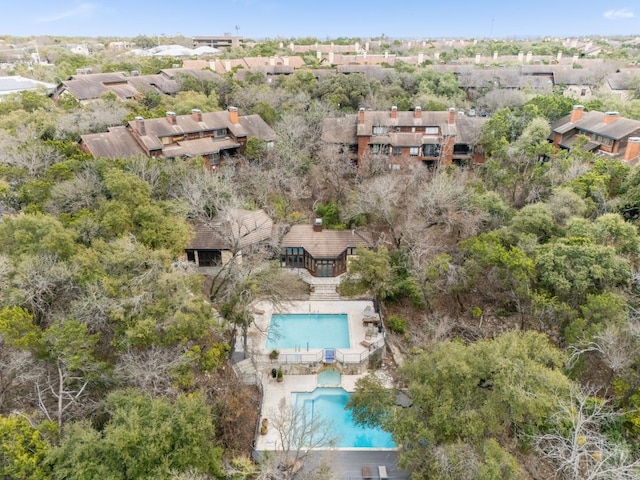 birds eye view of property with a residential view