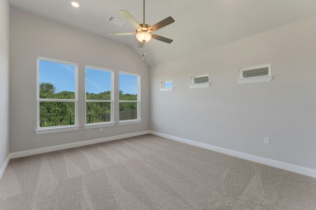 9908 Ephemeral Dr, Manor, TX 78653 - empty room featuring ceiling fan, light carpet, healthy amount of natural light, vaulted ceiling, and recessed lighting