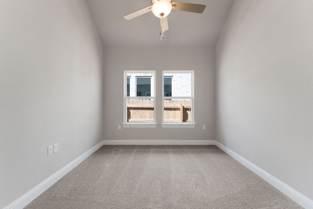 9908 Ephemeral Dr, Manor, TX 78653 - carpeted spare room featuring a ceiling fan and vaulted ceiling