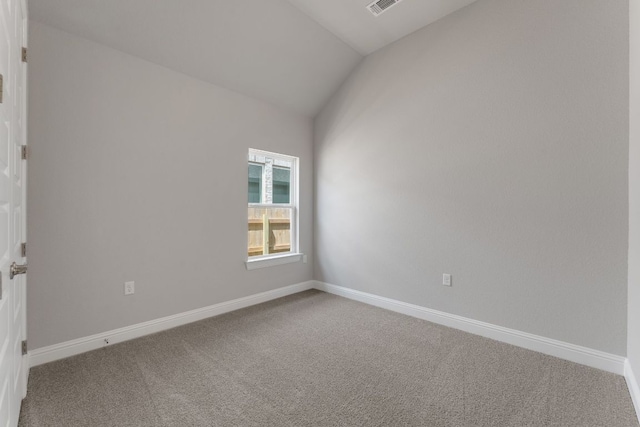9908 Ephemeral Dr, Manor, TX 78653 - spare room with carpet floors and lofted ceiling