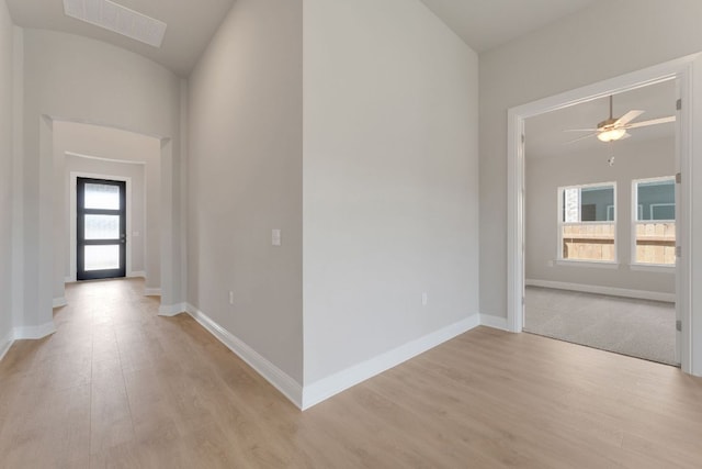 9908 Ephemeral Dr, Manor, TX 78653 - corridor featuring light wood finished floors and baseboards