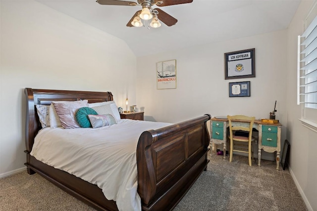 carpeted bedroom featuring vaulted ceiling, ceiling fan, and baseboards