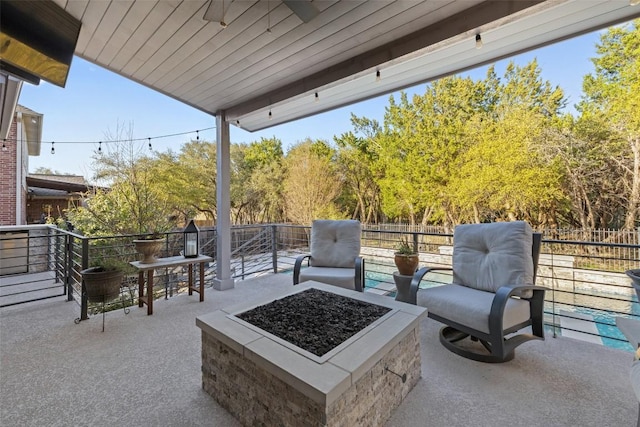 22128 Rose Grass Ln, Spicewood, TX 78669 - view of patio / terrace with an outdoor fire pit