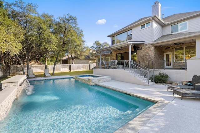 22128 Rose Grass Ln, Spicewood, TX 78669 - view of swimming pool featuring a ceiling fan, a patio, a pool with connected hot tub, and stairs