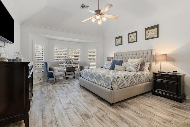 22128 Rose Grass Ln, Spicewood, TX 78669 - bedroom with light wood-style flooring, lofted ceiling, ceiling fan, and crown molding