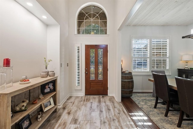 22128 Rose Grass Ln, Spicewood, TX 78669 - foyer with wood finished floors, recessed lighting, and baseboards