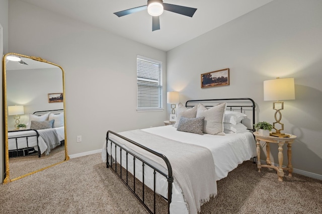 bedroom with ceiling fan, carpet floors, and baseboards