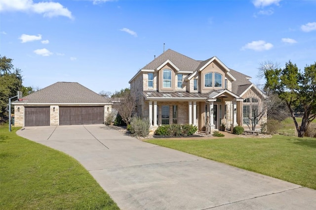 view of front of home featuring stone siding, metal roof, roof with shingles, a standing seam roof, and a front yard