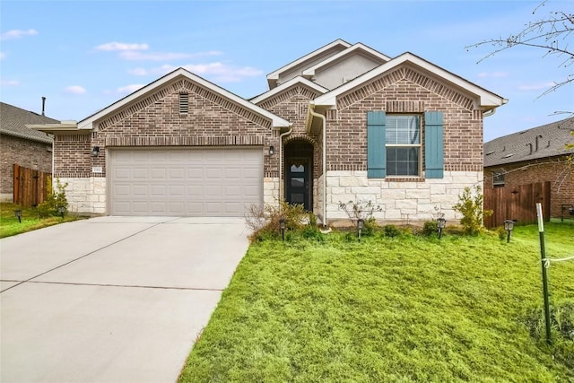 single story home featuring stone siding, an attached garage, fence, and driveway