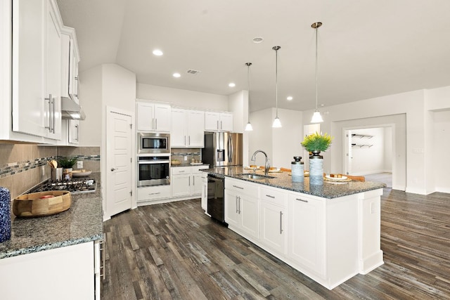 kitchen with white cabinets, under cabinet range hood, stainless steel appliances, and a sink