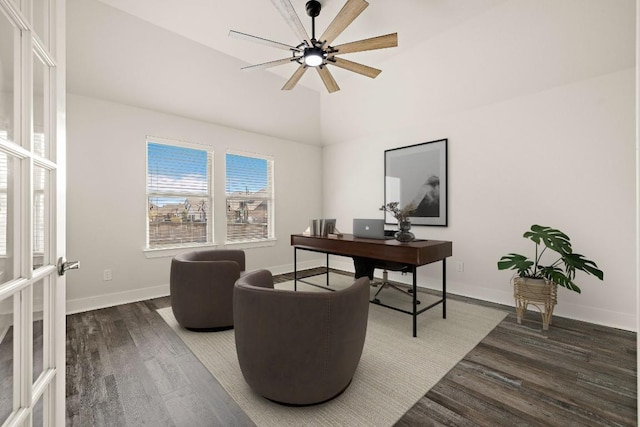 office area featuring ceiling fan, baseboards, vaulted ceiling, and wood finished floors