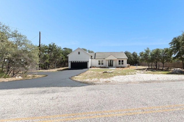 101 Saddle Mtn, Boerne, TX 78006 - modern inspired farmhouse with driveway and a garage