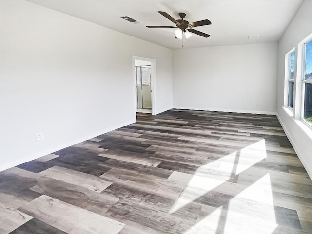 127 Campos Dr, Hutto, TX 78634 - spare room with ceiling fan and wood finished floors