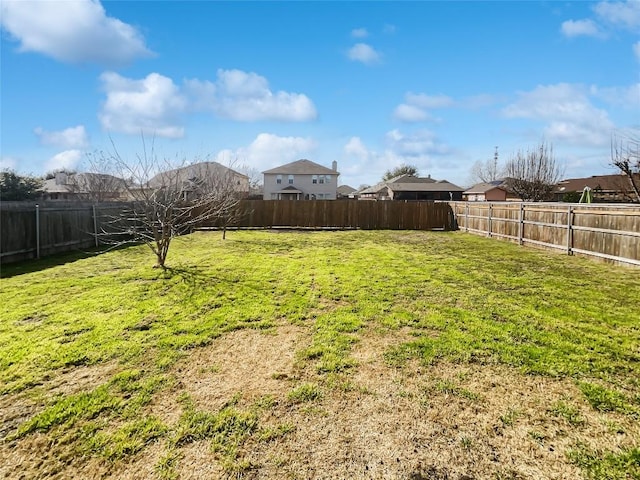 view of yard featuring a fenced backyard