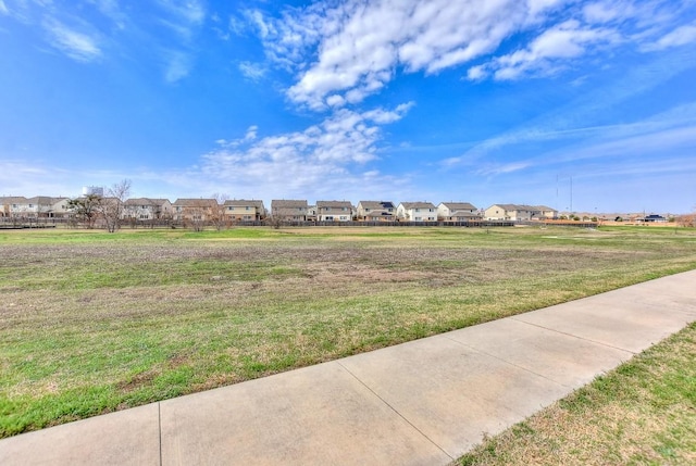 view of yard with a residential view