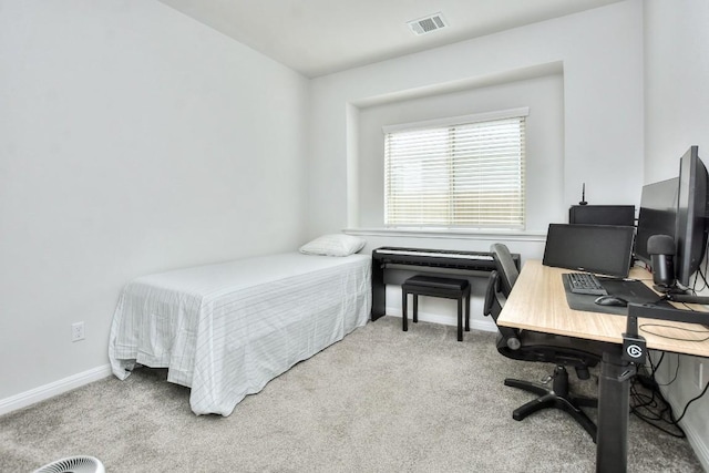 bedroom with carpet flooring, visible vents, and baseboards