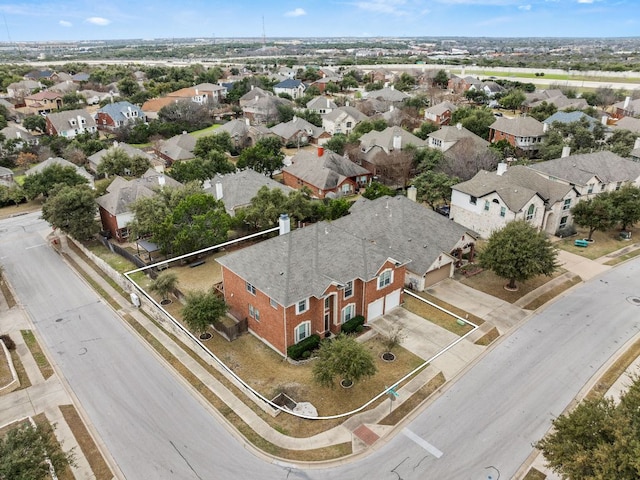 bird's eye view with a residential view