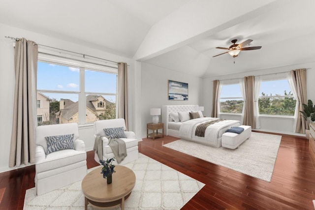 bedroom featuring ceiling fan, baseboards, vaulted ceiling, and wood finished floors