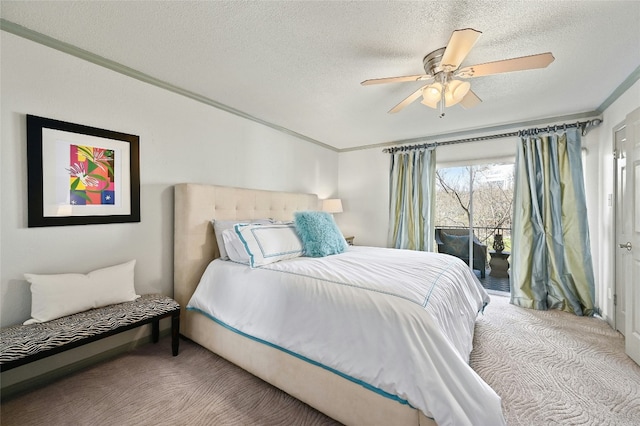 bedroom with carpet, access to outside, ornamental molding, and a textured ceiling