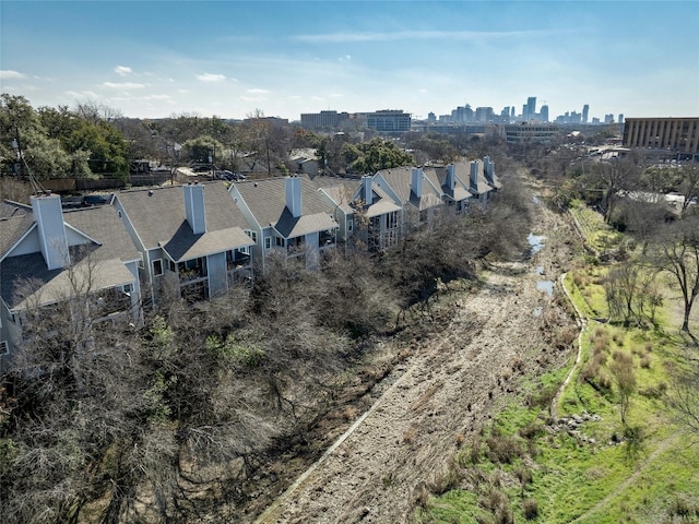 drone / aerial view featuring a city view