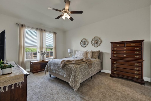 bedroom featuring carpet, baseboards, and ceiling fan