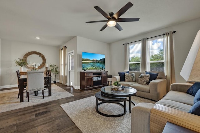 living area with ceiling fan, dark wood-type flooring, recessed lighting, and baseboards