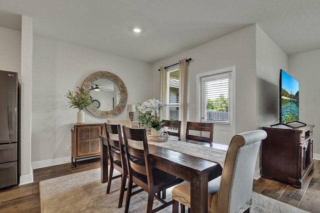 dining room featuring recessed lighting, wood finished floors, and baseboards