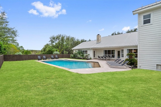 view of pool featuring a patio area, a fenced backyard, a fenced in pool, and a lawn