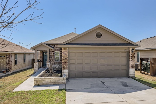 single story home featuring a garage, concrete driveway, and brick siding