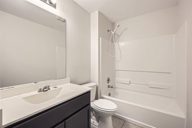 bathroom featuring tile patterned flooring, vanity, toilet, and bathing tub / shower combination