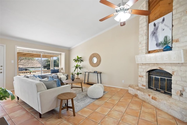 tiled living area featuring ornamental molding, a fireplace, vaulted ceiling, and baseboards