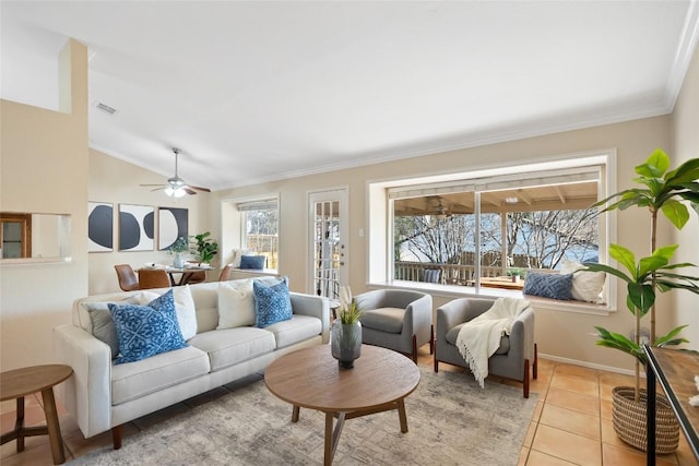 living area with crown molding, visible vents, a ceiling fan, light tile patterned flooring, and vaulted ceiling