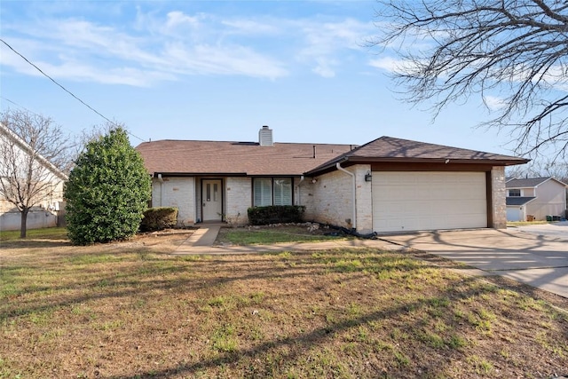 ranch-style home with a garage, brick siding, driveway, a chimney, and a front yard