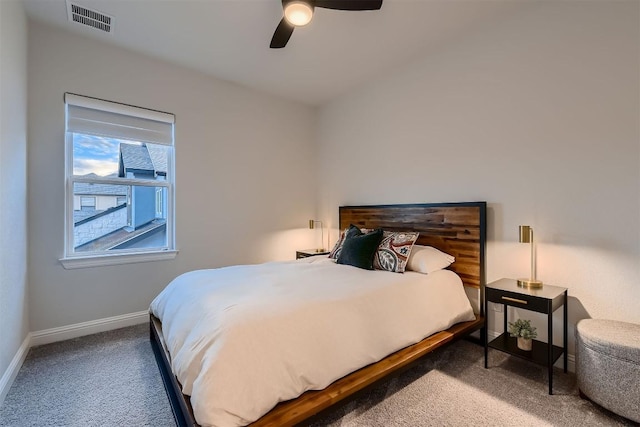 bedroom with ceiling fan, carpet, visible vents, and baseboards