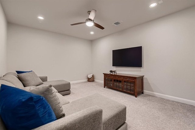 living area featuring carpet, visible vents, and baseboards