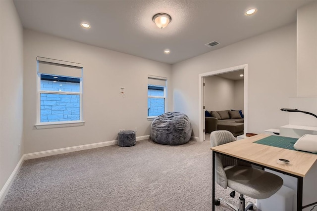 office space with baseboards, visible vents, carpet flooring, and recessed lighting